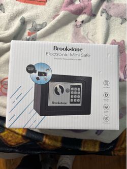 Brookstone electronic mini safe New with Box