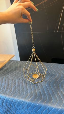 Hanging tea light holder