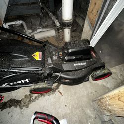 Electric Lawnmower With Leaf Blower And Weed Trimmer  