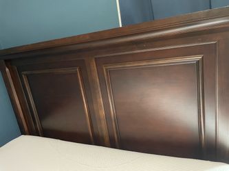Queen size mattress with bedframe and sheets