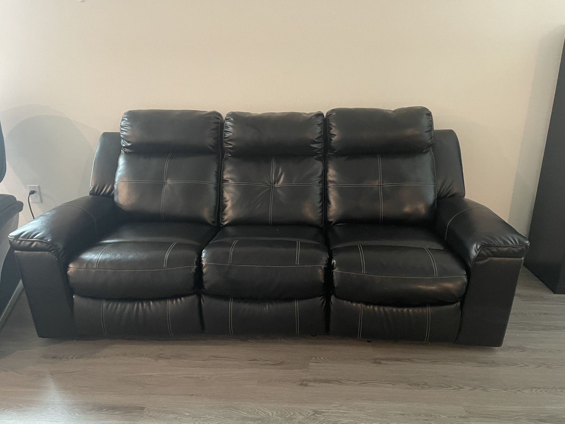 Black Leather Electric Reclining Sofa
