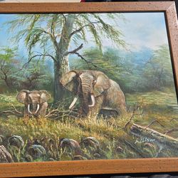 "Stunning framed painting of elephants in a serene savanna