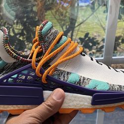 Preowned Adidas Pharrell NMD sz 10.5 Solar