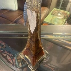 glass decanter  shaped like Eiffel Tower and sealed w infused vinegar