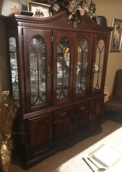 All cherry wood china cabinet