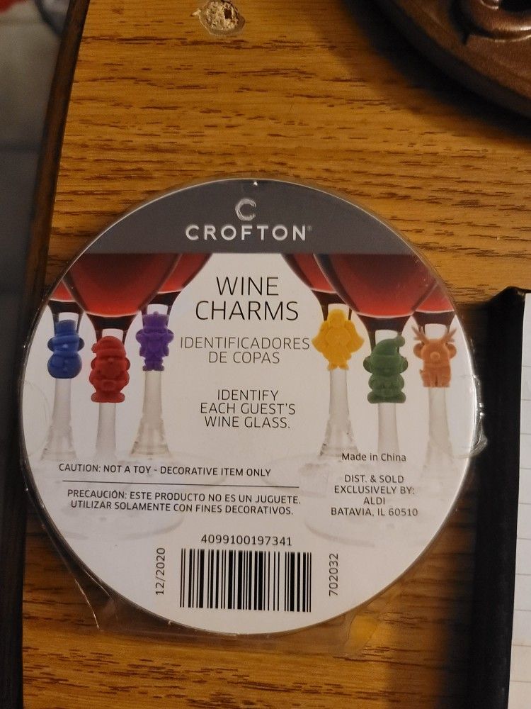 Hangs On Wine Bottles