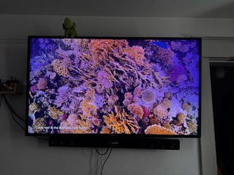 LG 55” 4K UHD TV plus soundbar and subwoofer