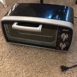 Oster 4-Slice Compact Toaster Oven (Model TSSTTVVG01)