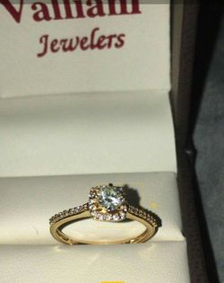 18k rose gold ring over a karat of vs diamonds