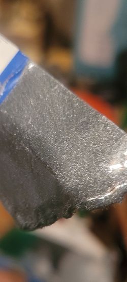 Silver metallic flake car paint