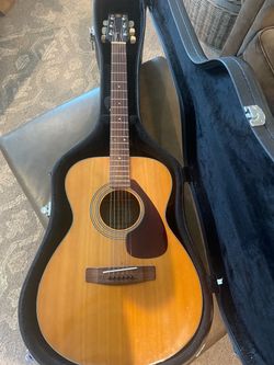 Vintage 1973 Yamaha folk guitar with hard case