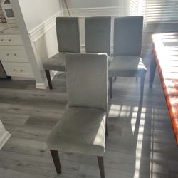 4 Emerald colored chairs