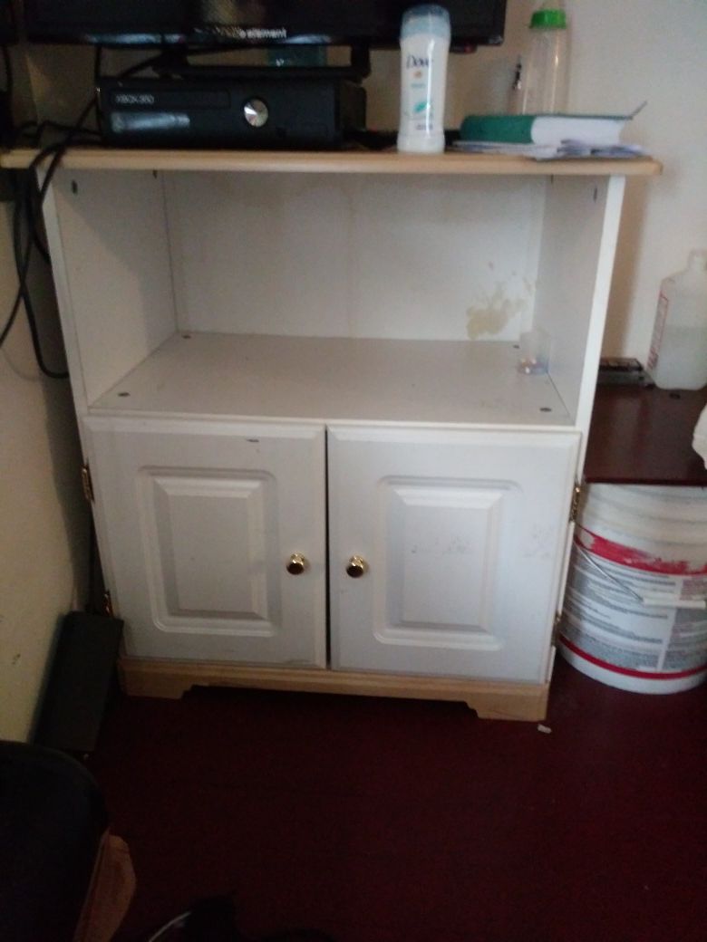 White cabinet with shelf