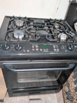 Brand new 5 burner stove, gas, general electric, digital and a LG cabinet microwave humongous microwave brand new as well. Very very good condition. S