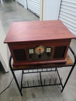 Record player with stand.