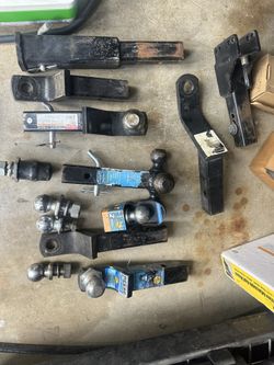 Assorted Trailer Hitches, And Six Balls
