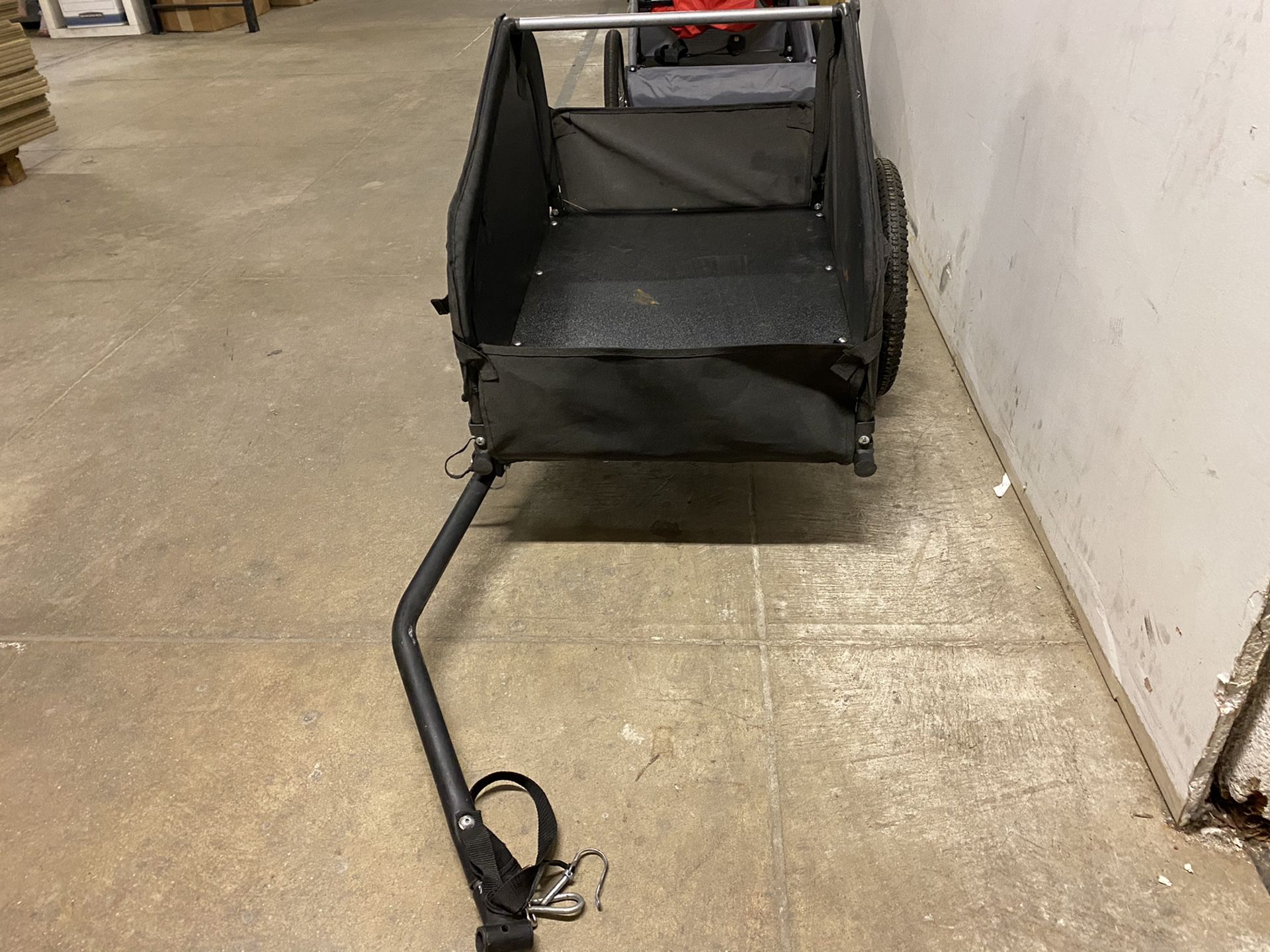 Barley used bike trailer. Great condition. Durable and light weight.