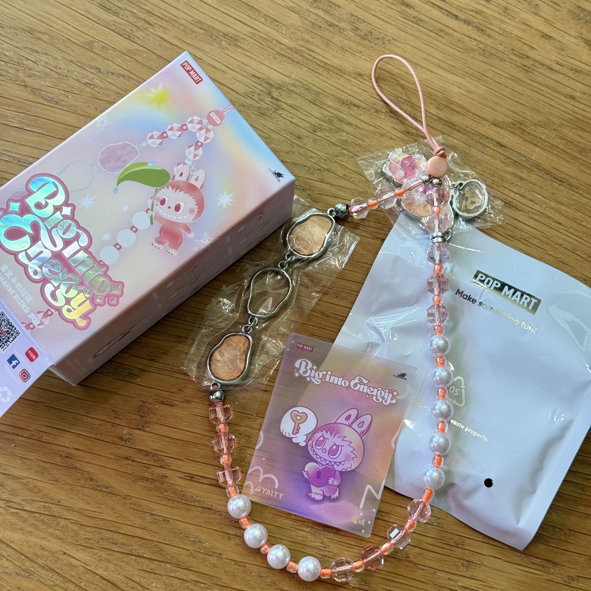 Big Into Energy Phone Charm (LOYALTY)