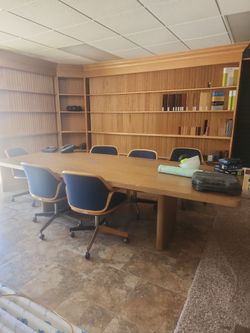 Wooden  conference room table with 6 chairs