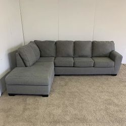 Living Spaces Gray McDade Sectional Sofa with LAF Chaise