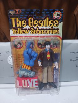 1999 The Beatles Yellow submarine with Paul with glove and love base. New.  Collectible.  MacFarlane.