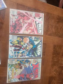 LOT 8 Comics - Marvel XMen sealed & boarded - 2 have collectible cards included