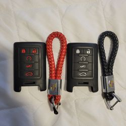 USED CADILLAC SILICONE COVER FOR KEY FOB WITH BREADED SCREW IN CHARM RED  AND BLACK  10$  EACH 
11525 S HALSTED DUNKIN DONUTS 
10$  CASH ONLY AS IS