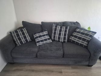Free Couch, a couple broken springs, must pick up in OB/PT LOMA