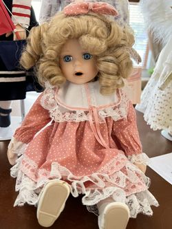 Mini Sitting Porcelain Doll
