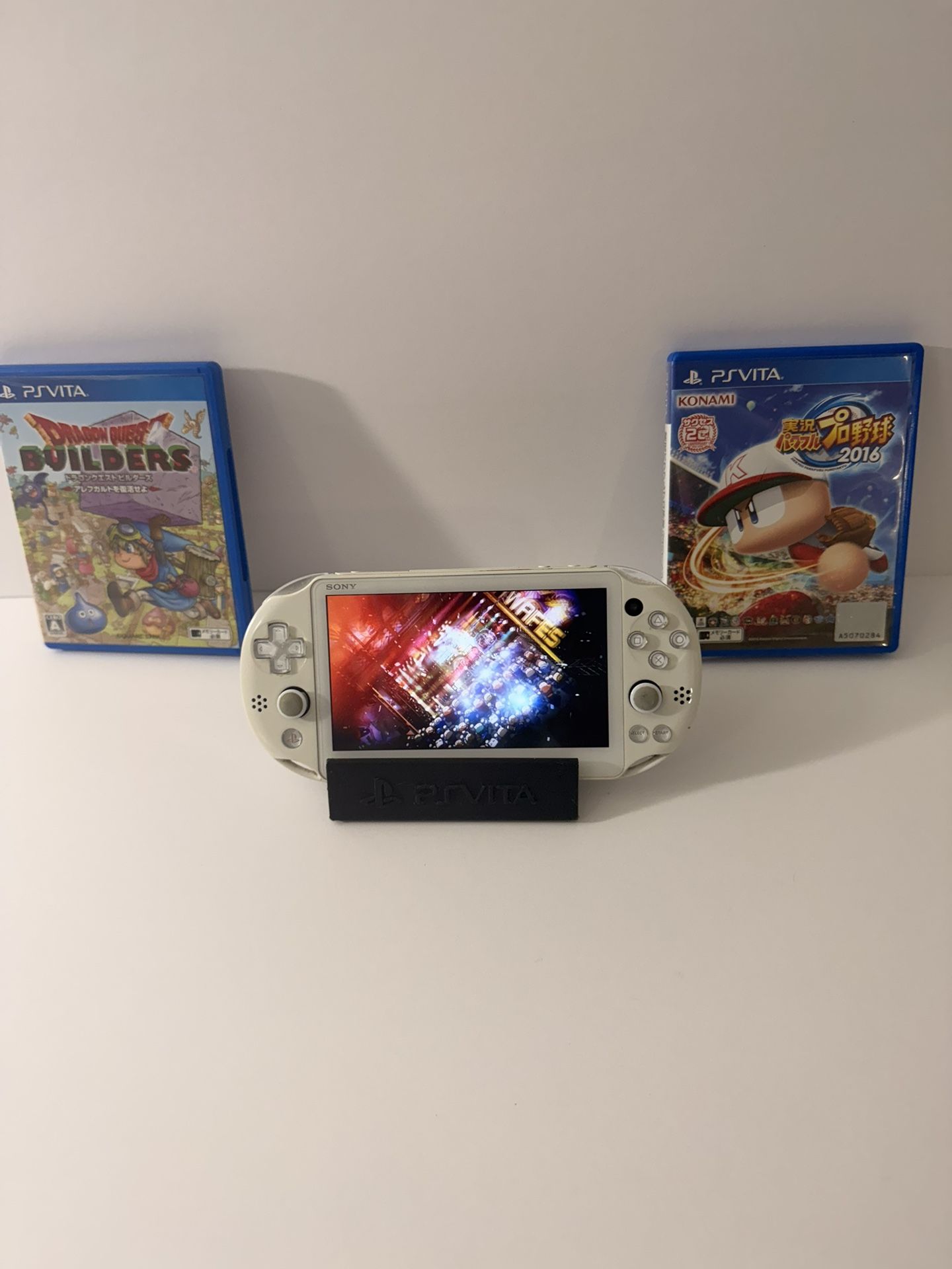 White PS VITA 2000 Comes With 2 Games Very Good Condition
