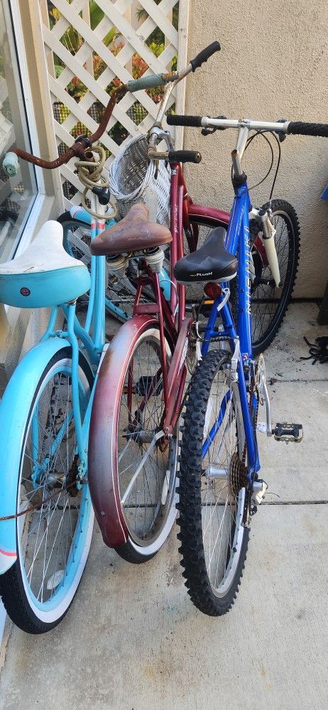 Three Bikes: Schwinn, Murray Westport, Nishiki Manatoba