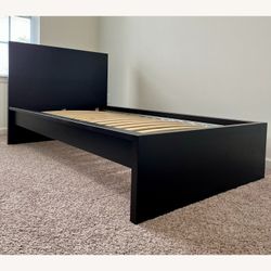 LIGHTLY USED STATIONARY EXERCISE BIKE, AND FUTON, AND USED IKEA FULL TWIN BED FRAME 