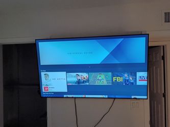 Large Flat Screen Smart TV / couch / bed