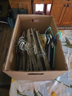 Box full of plastic hangers