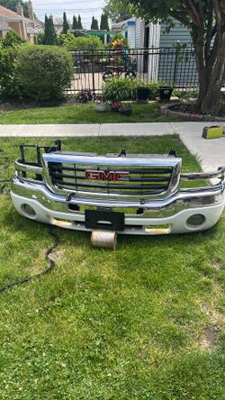 Gmc front bumper and grill asembly