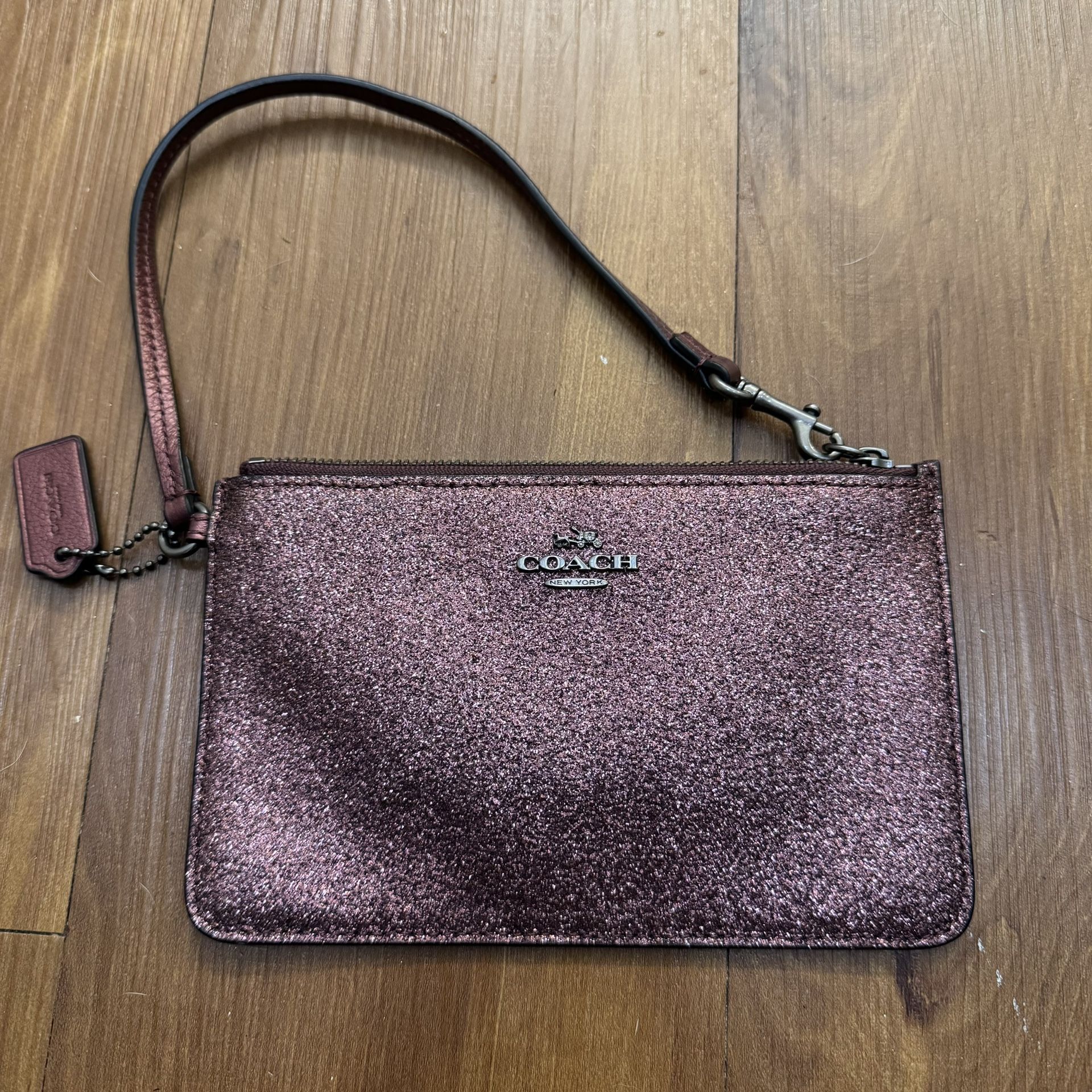 coach pink glitter clutch wristlet
