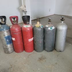 B acetylene , mc acetylene, oxygen, and co2 tanks