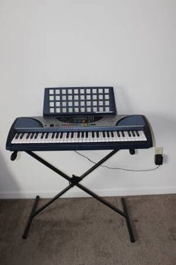 Yamaha keyboard with stand