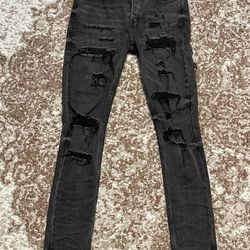Deisgner jeans, ripped black. “Van Winkle Black Dynamite Trash”