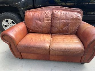 Small Love Seat Brown Orange Color Slightly Faded Sofa Lounging