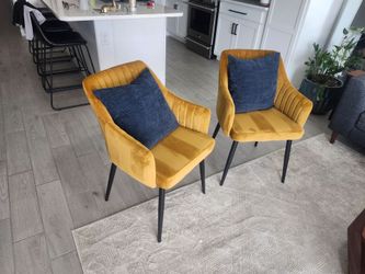 2 gold chairs