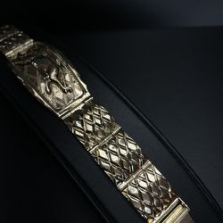 40.4 14KT YG LION BRACELET 