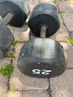Single 25 and 30 pound dumbbells