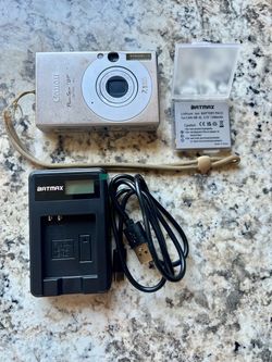 CANON POWERSHOT SD1000 DIGITAL ELPH 7.1MP 3X OPTICAL ZOOM SILVER DIGITAL CAMERA