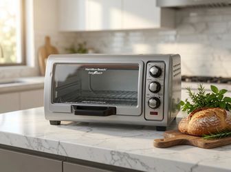 Hamilton Beach Easy Reach Countertop Toaster Oven With Roll-Top Door– like new Condition (10x12.5)