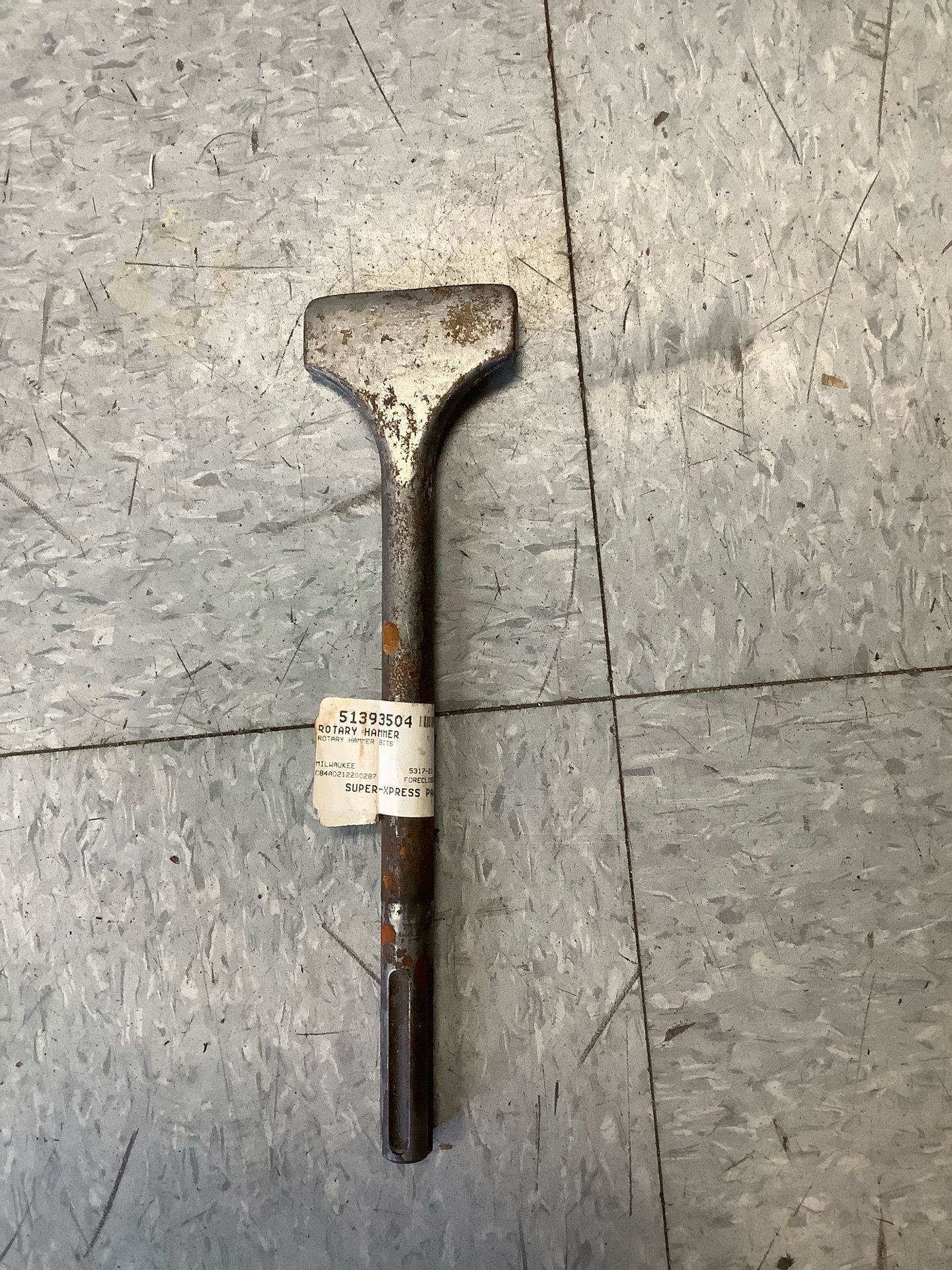 Milwaukee SDS-plus scaling chisel tool.