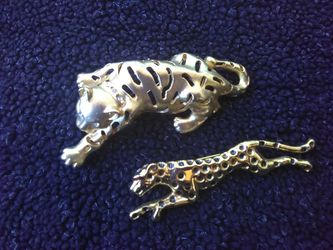 Big cat gold tone broaches. With enamel and crystals. Very bold and fun to wear!