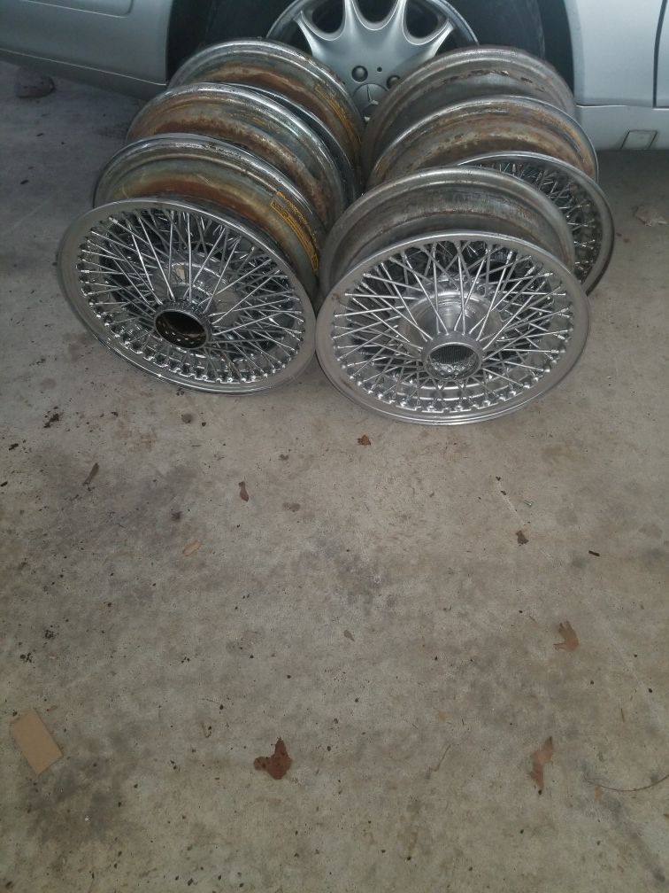 I have a set of original jaguar wire wheels plus to extra