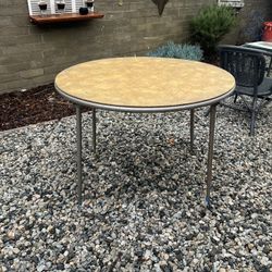 Vintage 1960s Round Folding Card Table – 40” Mid Century Style  ⸻  DESCRIPTION  Vintage round folding card table with a classic mid-century look. Grea