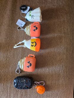 Bath and body hand sanitizer holders